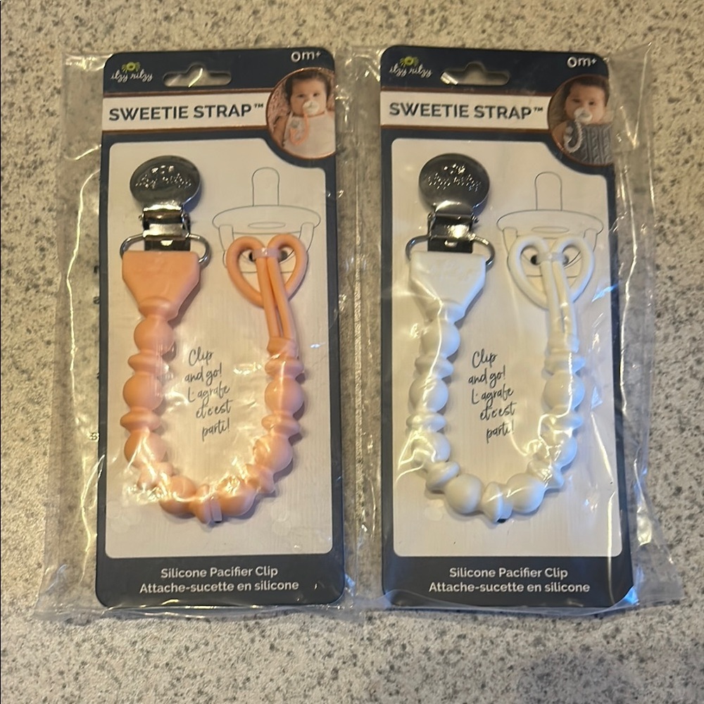 Itzy Ritzy Sweetie Strap Silicone Pacifier Clip - Peach and White